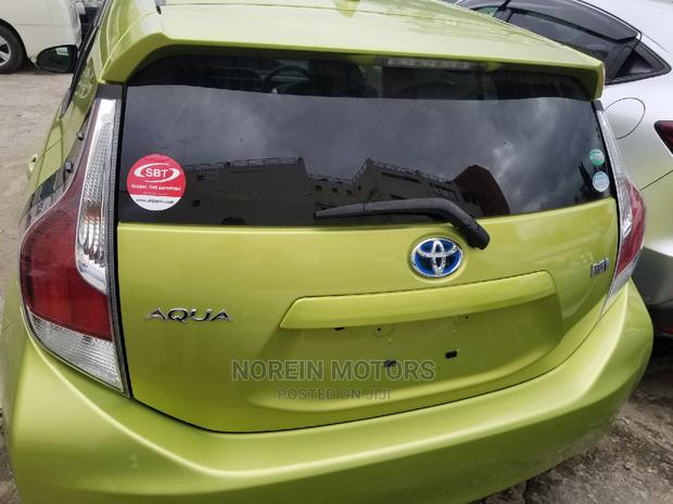 2015 Toyota Aqua in Yellow - Modern and Versatile Compact Vehicle