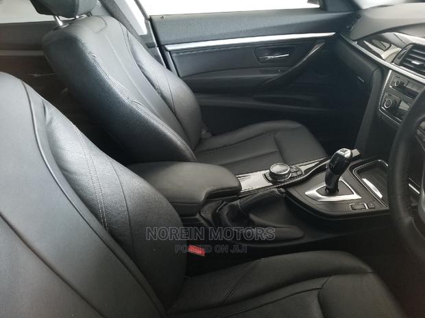 2015 BMW 320i Red Sedan: Premium Performance