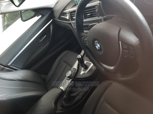 2015 BMW 320i Red Sedan: Premium Performance