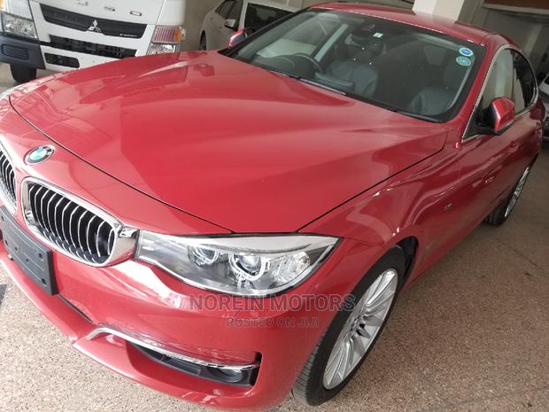 2015 BMW 320i Red Sedan: Premium Performance