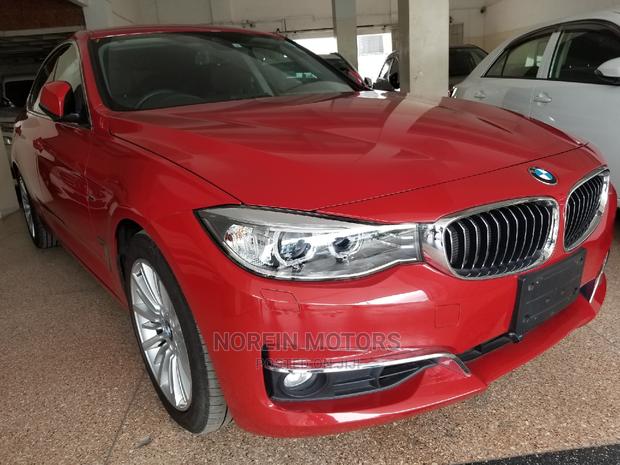 2015 BMW 320i Red Sedan: Premium Performance
