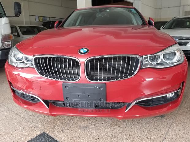 2015 BMW 320i Red Sedan: Premium Performance