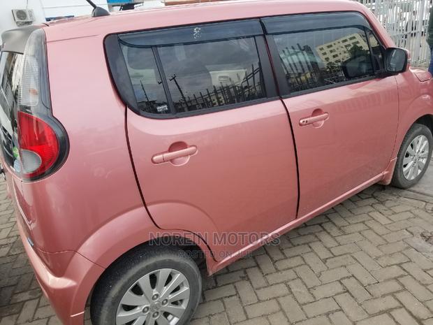 Pink Nissan Moco 2014 - Stylish Compact SUV at Great Price