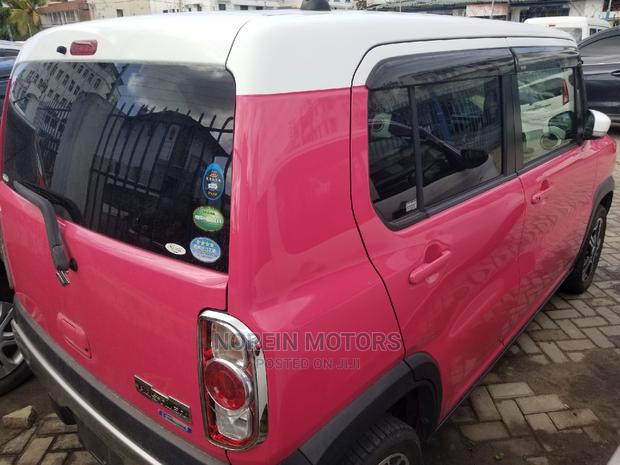 Experience the Vibe with 2014 Pink Suzuki Hustler