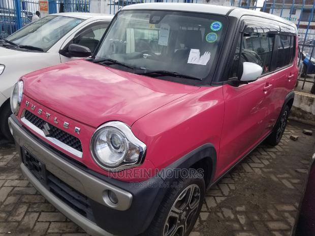 Experience the Vibe with 2014 Pink Suzuki Hustler