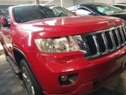 2015 Jeep Grand Cherokee Red: Off-Road SUV with Elegant Red Finish for sale