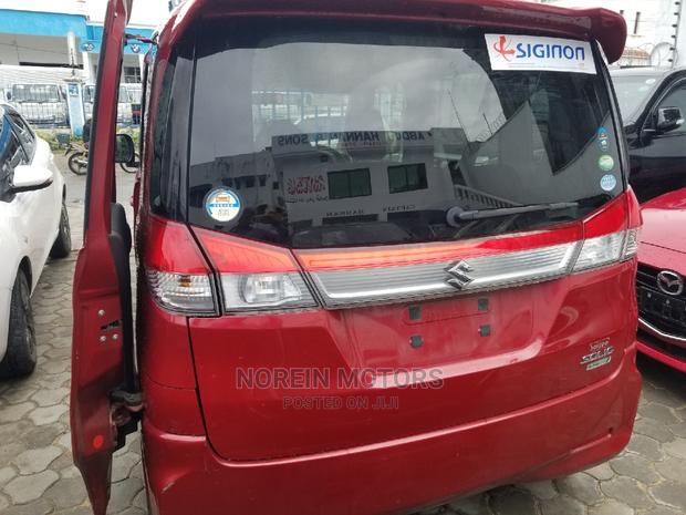 Red 2015 Solio by Suzuki: Quality Used Sedan Available