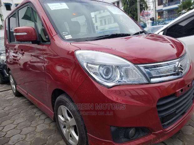 Red 2015 Solio by Suzuki: Quality Used Sedan Available