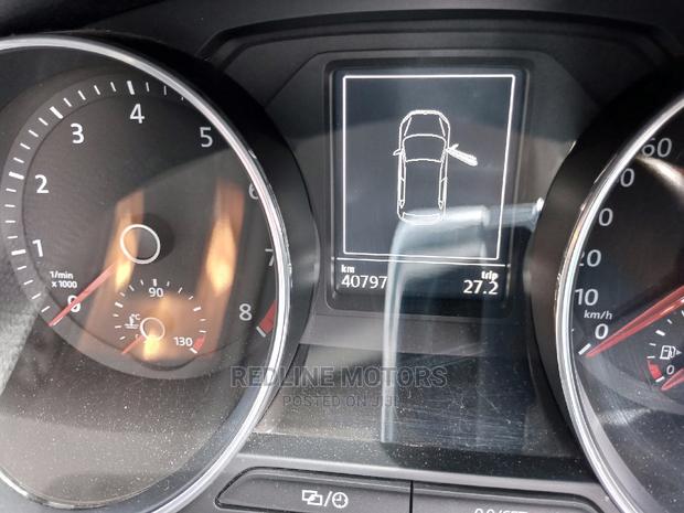 2016 Passat in Orange: Volkswagen's Masterpiece for the Road