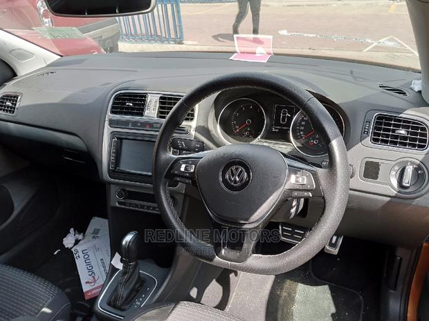 2016 Passat in Orange: Volkswagen's Masterpiece for the Road