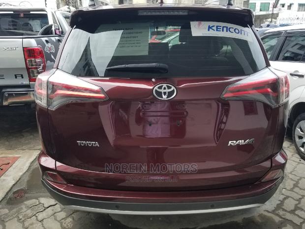 Used 2015 Toyota RAV4 LE 4dr SUV with 2.5L 4cyl 6A - Red