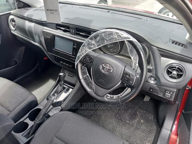 2016 Red Auris Toyota: Affordable and Reliable