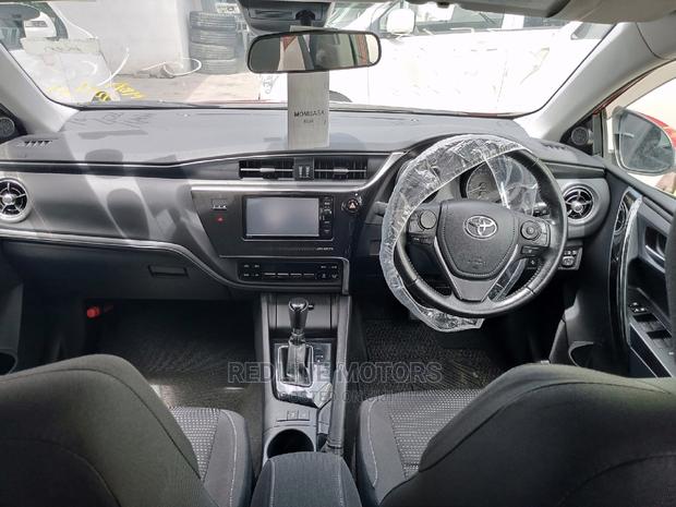 2016 Red Auris Toyota: Affordable and Reliable