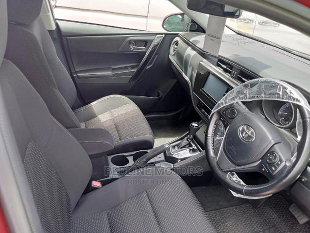 2016 Red Auris Toyota: Affordable and Reliable