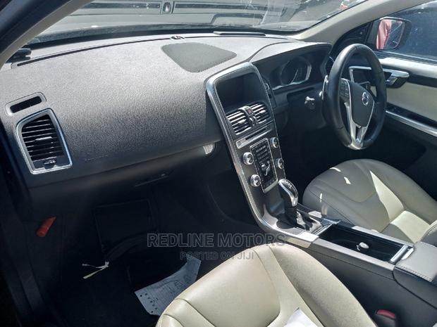 Orange Hued 2016 Volvo XC60 T5 AWD All-Wheel Drive