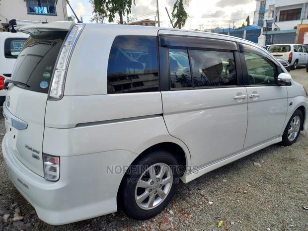 White 2015 Toyota ISIS - Pre-owned Sedan for Everyday Use