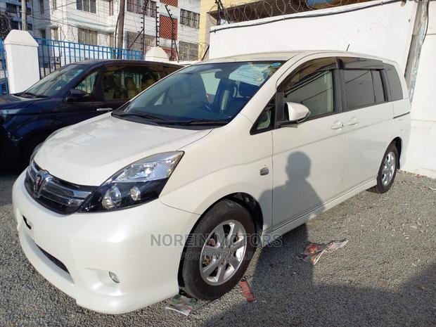 White 2015 Toyota ISIS - Pre-owned Sedan for Everyday Use