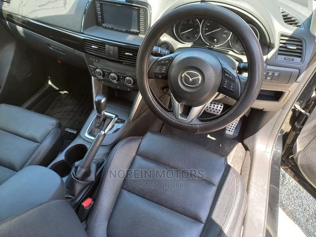 2015 Mazda CX-5 in Rich Burgundy: Modern Luxury SUV for Your Drive!