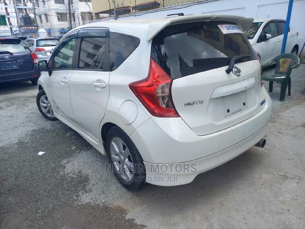 Stylish 2015 Nissan Note in White: Compact Car with Great Value