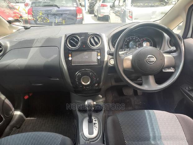 Stylish 2015 Nissan Note in White: Compact Car with Great Value
