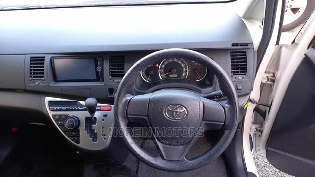 White 2015 Toyota ISIS - Pre-owned Sedan for Everyday Use