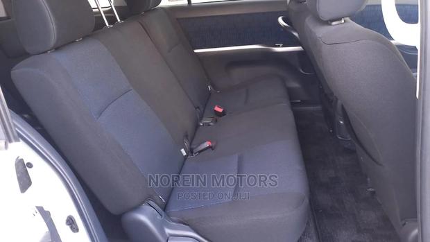 White 2015 Toyota ISIS - Pre-owned Sedan for Everyday Use