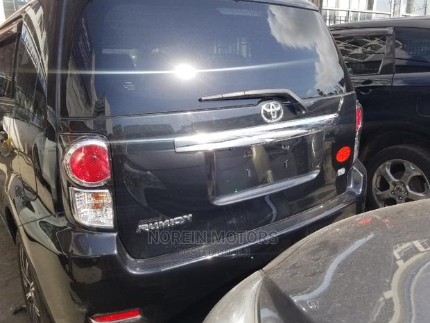 Black 2015 Toyota Corolla Rumion - Affordable, Modern, and Efficient