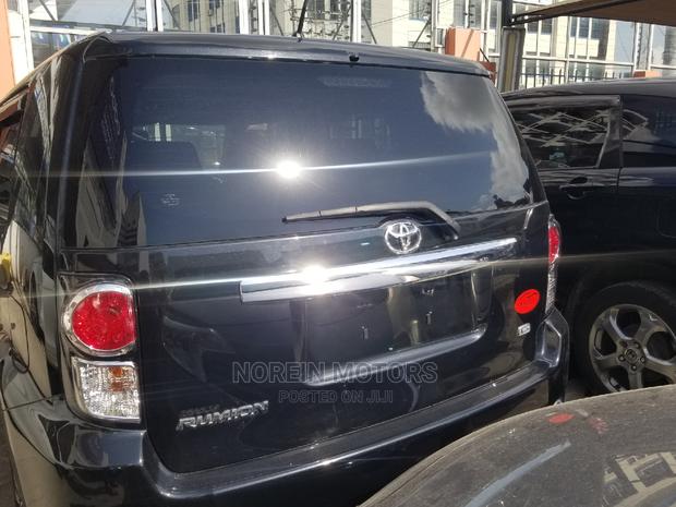Black 2015 Toyota Corolla Rumion - Affordable, Modern, and Efficient