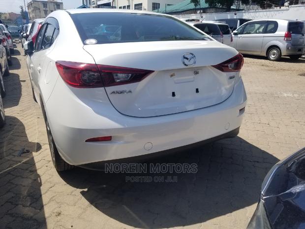 Mazda Axela 2015 in White: Elegant, Economical, and Ready to Drive