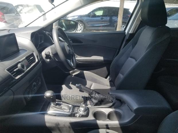 Mazda Axela 2015 in White: Elegant, Economical, and Ready to Drive