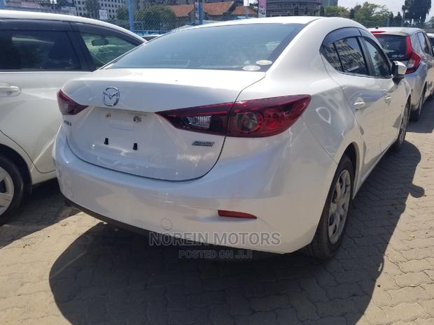 Mazda Axela 2015 in White: Elegant, Economical, and Ready to Drive