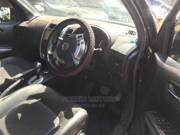 2012 Black Nissan X-Trail: Pre-Owned SUV with Style