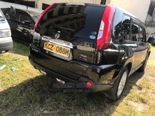 2012 Black Nissan X-Trail: Pre-Owned SUV with Style