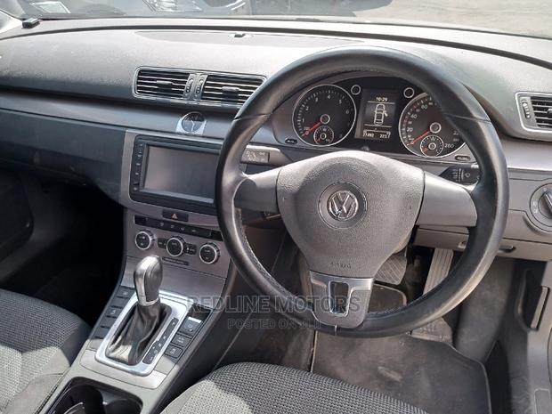 Volkswagen 2016 Passat Off-White: Elegant Sedan on Offer