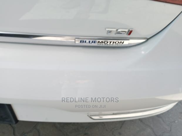 Volkswagen 2016 Passat Off-White: Elegant Sedan on Offer