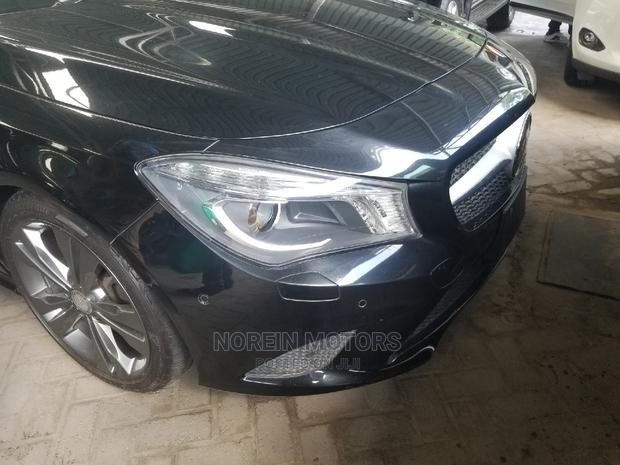 sleek 2015 Mercedes-Benz C180 in Black: Stunning Compact Sedan