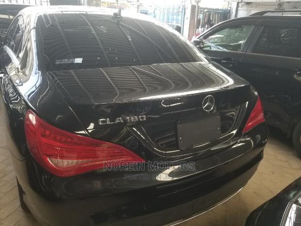 sleek 2015 Mercedes-Benz C180 in Black: Stunning Compact Sedan