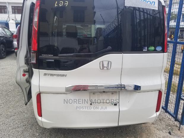 White 2016 Honda Stepwgn: Family-Friendly and Reliable