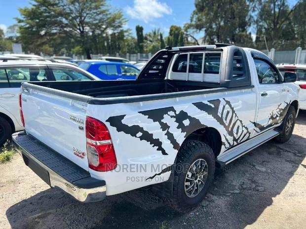 2015 Toyota Hilux in White: Affordable and Durable Pickup
