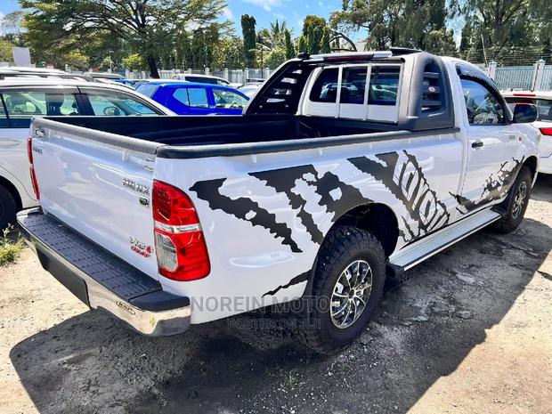 2015 Toyota Hilux in White: Affordable and Durable Pickup