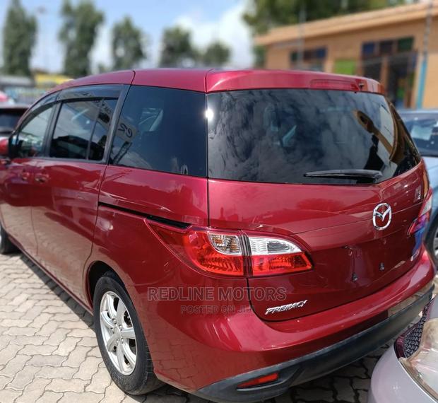 Red Mazda Premacy 2016: Reliable & Stylish Minivan for Your Family