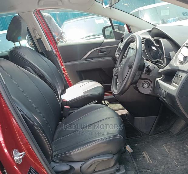 Red Mazda Premacy 2016: Reliable & Stylish Minivan for Your Family