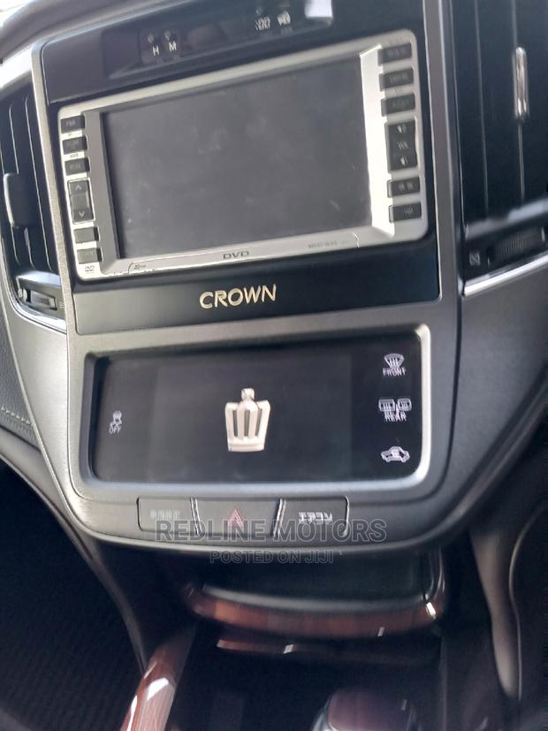 Red 2016 Toyota Crown: Modern, Comfortable Sedan with Power