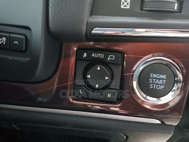 Red 2016 Toyota Crown: Modern, Comfortable Sedan with Power