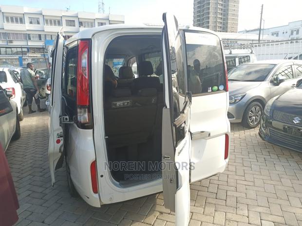 Honda Stepwgn 2015 Beige: Pre-Owned 4WD Vehicle for Sale