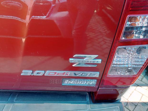 Orange 2016 Isuzu D-Max: Modern Pickup with Style