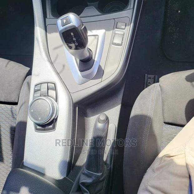 2016 BMW 116i Pearl - Luxury Compact Sedan