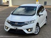 White Honda Fit EX-L 2016: Modern Compact Car for Sale for sale