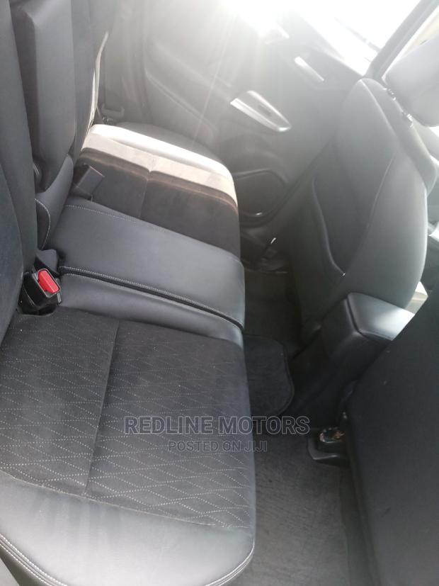 Blue 2016 Honda Fit 1.5 Hybrid: Affordable, Efficient Transportation