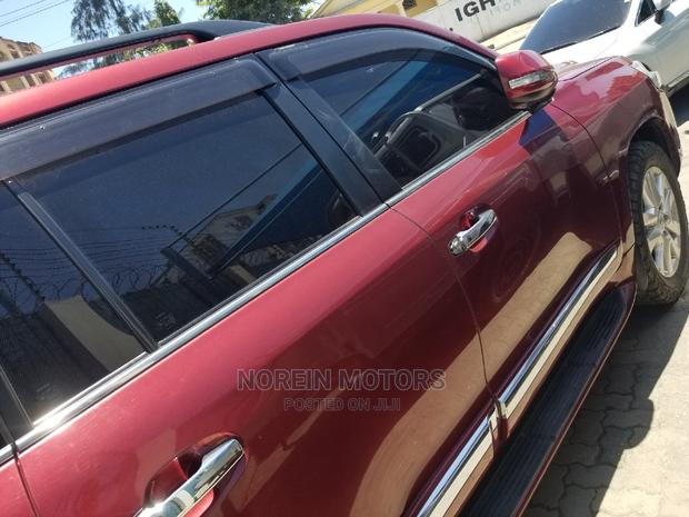 2016 Toyota Land Cruiser in Red - Durable and Reliable Off-Roader